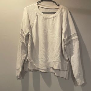 white athletic sweater